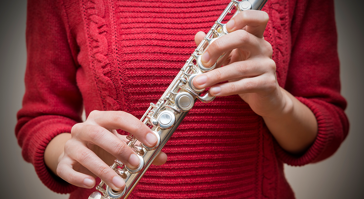 woman-holding-flute