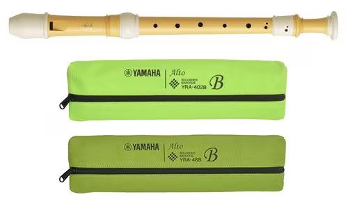 Yamaha plant-based recorder lying horizontally next to a bright green bag